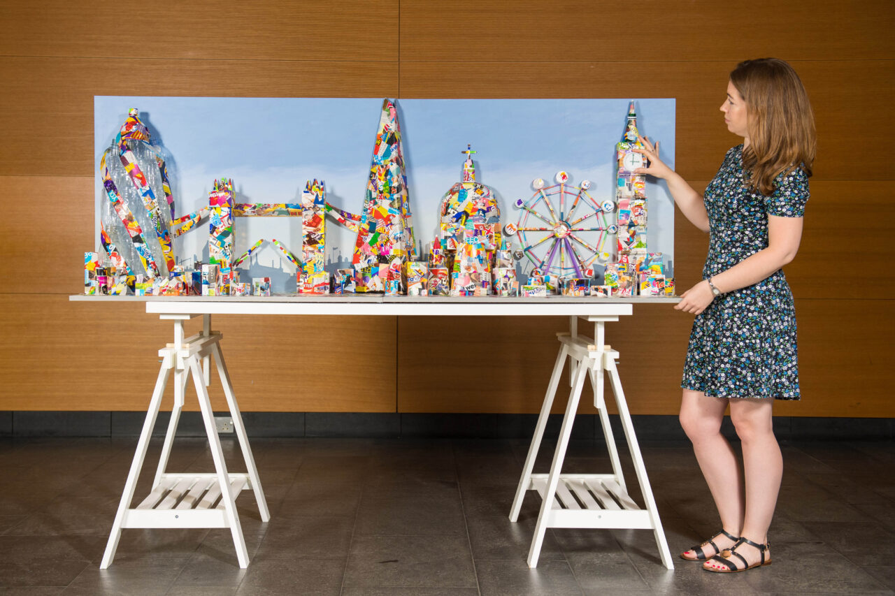 A 3D sculpture of the modern London skyline made from recycled materials
