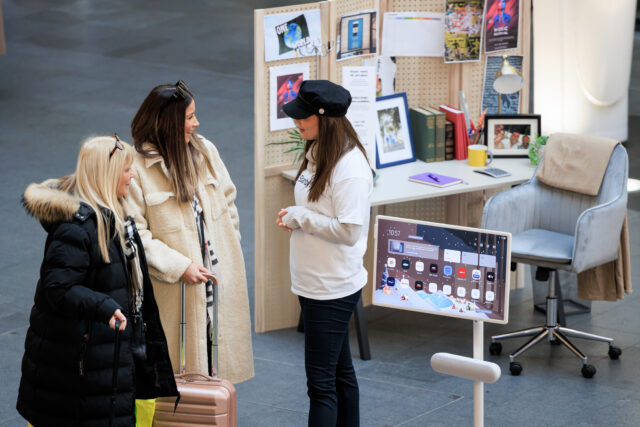 promo team chatting to commuters at Kings Cross